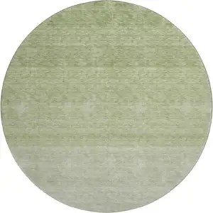 Photo of 8' Green And Ivory Ombre Washable Round Rug With UV Protection