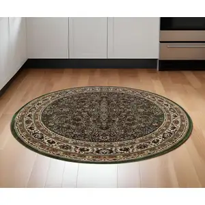 Photo of 6' Green And Ivory Oriental Round Rug