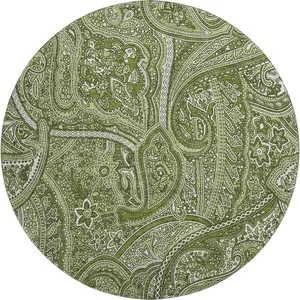 Photo of 8' Green And Ivory Paisley Washable Round Rug With UV Protection