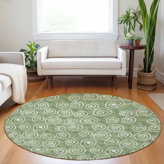 8' Green And Ivory Polka Dot Washable Round Rug With UV Protection Photo 5