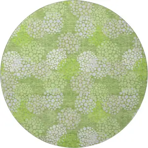 Photo of 8' Green And Ivory Polka Dot Washable Round Rug With UV Protection