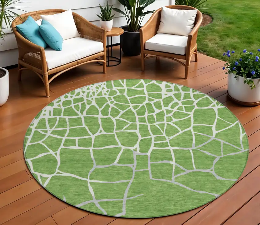 8' Green And Ivory Round Abstract Washable Indoor Outdoor Area Rug Photo 1