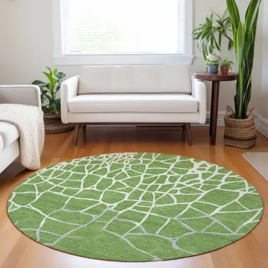 8' Green And Ivory Round Abstract Washable Indoor Outdoor Area Rug Photo 8