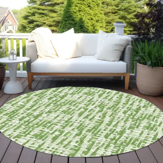 8' Green And Ivory Round Abstract Washable Indoor Outdoor Area Rug Photo 7