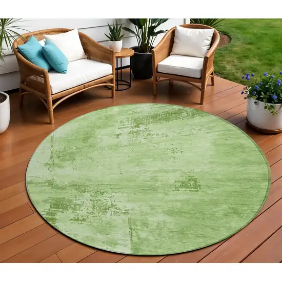 8' Green And Ivory Round Abstract Washable Indoor Outdoor Area Rug Photo 1