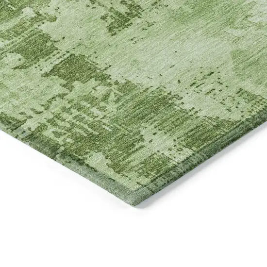 8' Green And Ivory Round Abstract Washable Indoor Outdoor Area Rug Photo 4