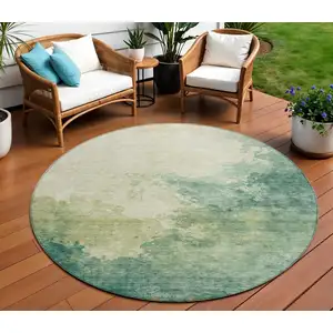 Photo of 8' Green And Ivory Round Abstract Washable Indoor Outdoor Area Rug