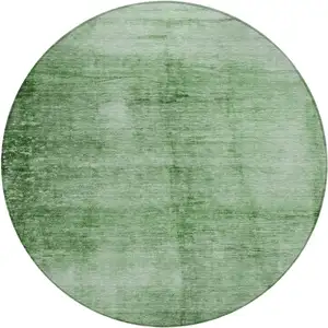 Photo of 8' Green And Ivory Round Abstract Washable Indoor Outdoor Area Rug