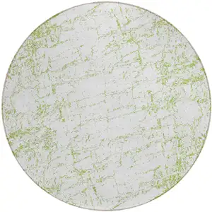 Photo of 8' Green And Ivory Round Abstract Washable Indoor Outdoor Area Rug
