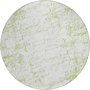 Photo of 8' Green And Ivory Round Abstract Washable Indoor Outdoor Area Rug
