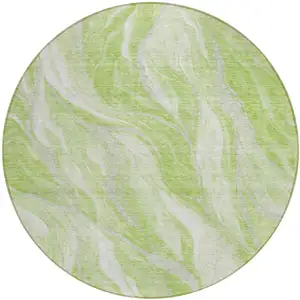 Photo of 8' Green And Ivory Round Abstract Washable Indoor Outdoor Area Rug