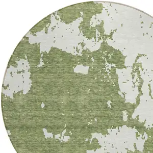 Photo of 8' Green And Ivory Round Abstract Washable Indoor Outdoor Area Rug