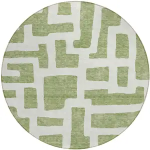 Photo of 8' Green And Ivory Round Abstract Washable Indoor Outdoor Area Rug