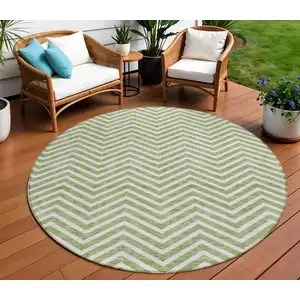 Photo of 8' Green And Ivory Round Chevron Washable Indoor Outdoor Area Rug