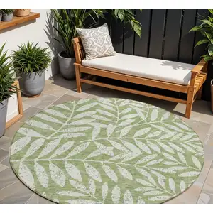 Photo of 8' Green And Ivory Round Floral Washable Indoor Outdoor Area Rug