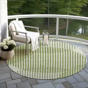 Photo of 8' Green And Ivory Round Geometric Washable Indoor Outdoor Area Rug