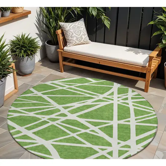 8' Green And Ivory Round Geometric Washable Indoor Outdoor Area Rug Photo 1