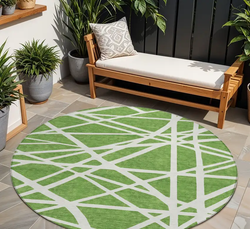 8' Green And Ivory Round Geometric Washable Indoor Outdoor Area Rug Photo 1