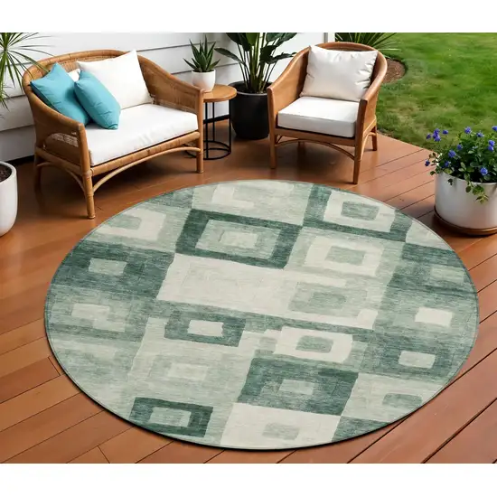 8' Green And Ivory Round Geometric Washable Indoor Outdoor Area Rug Photo 1
