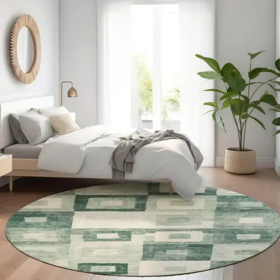 8' Green And Ivory Round Geometric Washable Indoor Outdoor Area Rug Photo 8