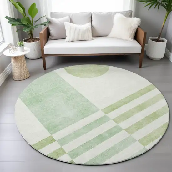 8' Green And Ivory Round Geometric Washable Indoor Outdoor Area Rug Photo 7