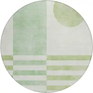 Photo of 8' Green And Ivory Round Geometric Washable Indoor Outdoor Area Rug