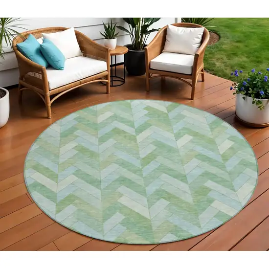 8' Green And Ivory Round Geometric Washable Indoor Outdoor Area Rug Photo 1