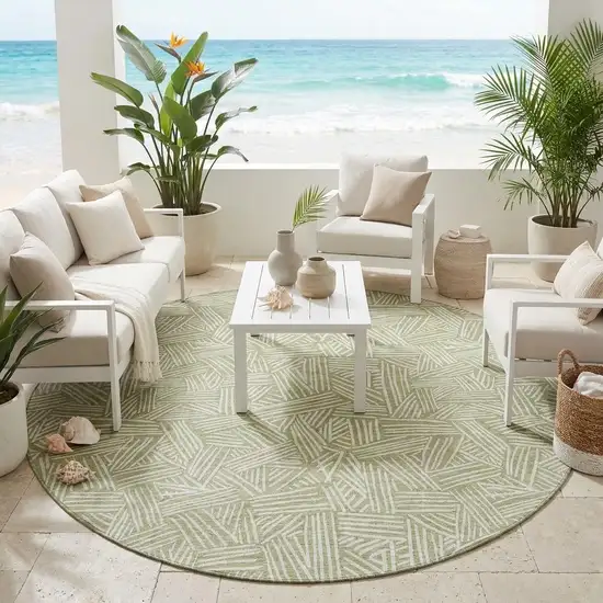 8' Green And Ivory Round Geometric Washable Indoor Outdoor Area Rug Photo 1