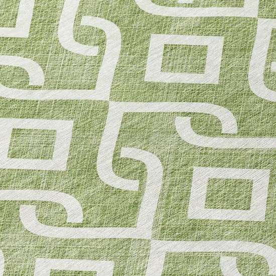 8' Green And Ivory Round Geometric Washable Indoor Outdoor Area Rug Photo 8