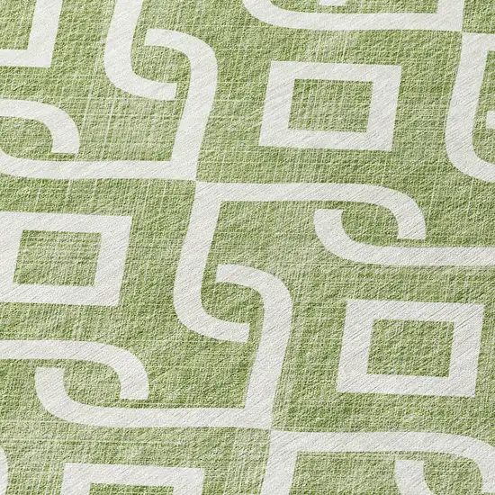 8' Green And Ivory Round Geometric Washable Indoor Outdoor Area Rug Photo 8