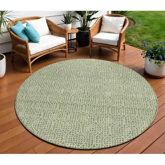 8' Green And Ivory Round Geometric Washable Indoor Outdoor Area Rug Photo 1