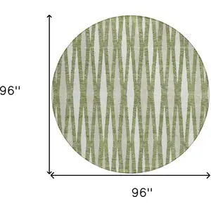 Photo of 8' Green And Ivory Round Geometric Washable Indoor Outdoor Area Rug