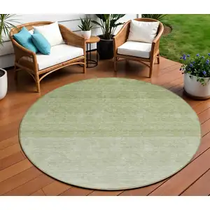 Photo of 8' Green And Ivory Round Ombre Washable Indoor Outdoor Area Rug
