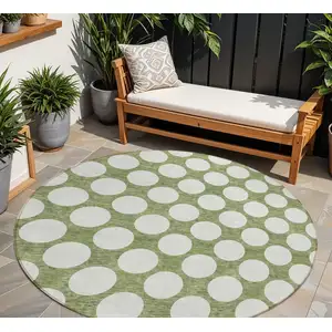 Photo of 8' Green And Ivory Round Polka Dot Washable Indoor Outdoor Area Rug