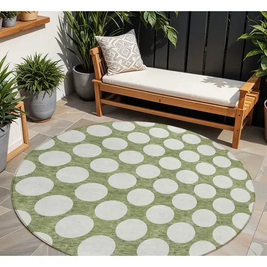 8' Green And Ivory Round Polka Dot Washable Indoor Outdoor Area Rug Photo 1
