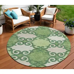 Photo of 8' Green And Ivory Round Trellis Washable Indoor Outdoor Area Rug
