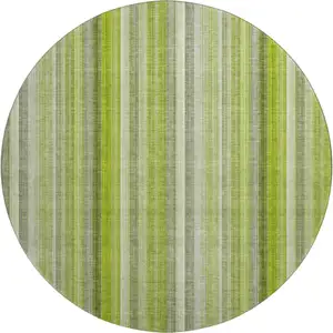 Photo of 8' Green And Ivory Striped Washable Round Rug With UV Protection