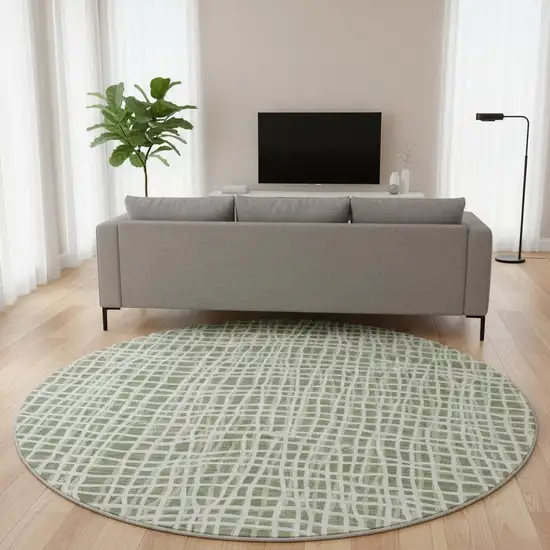 8' Green And Ivory Striped Washable Round Rug With UV Protection Photo 2