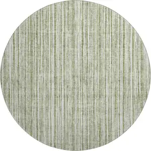 Photo of 8' Green And Ivory Striped Washable Round Rug With UV Protection