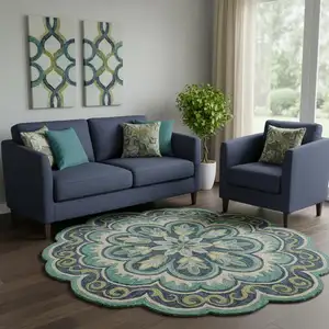 Photo of 8' Green And Ivory Wool Medallion Hand Tufted Round Rug