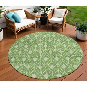 Photo of 8' Green And Light Green Round Geometric Washable Indoor Outdoor Area Rug
