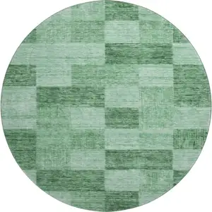 Photo of 8' Green And Mint Green Geometric Washable Round Rug With UV Protection