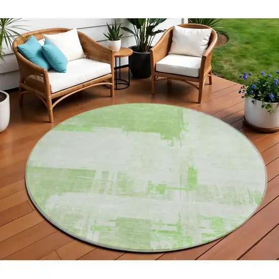 8' Green And Mint Green Round Abstract Washable Indoor Outdoor Area Rug Photo 1