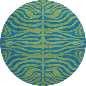 Photo of 8' Green And Navy Blue Animal Print Washable Round Rug With UV Protection