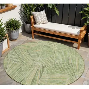 Photo of 8' Green And Olive Green Round Geometric Washable Indoor Outdoor Area Rug