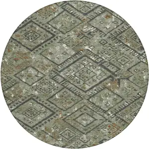 Photo of 8' Green And Orange Round Geometric Washable Indoor Outdoor Area Rug