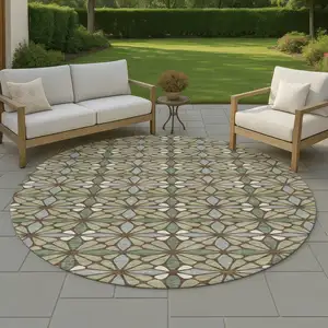 Photo of 8' Green And Sage Round Geometric Washable Indoor Outdoor Area Rug