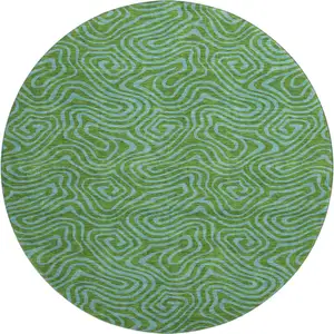 Photo of 8' Green And Sky Blue Abstract Washable Round Rug With UV Protection