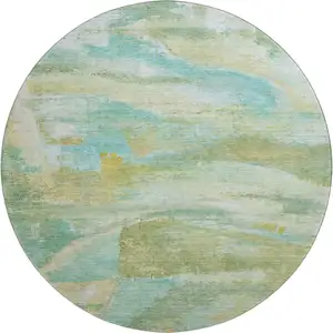 Photo of 8' Green And Teal Abstract Washable Round Rug With UV Protection