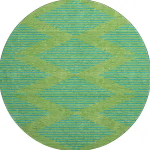 Photo of 8' Green And Teal Geometric Washable Round Rug With UV Protection
